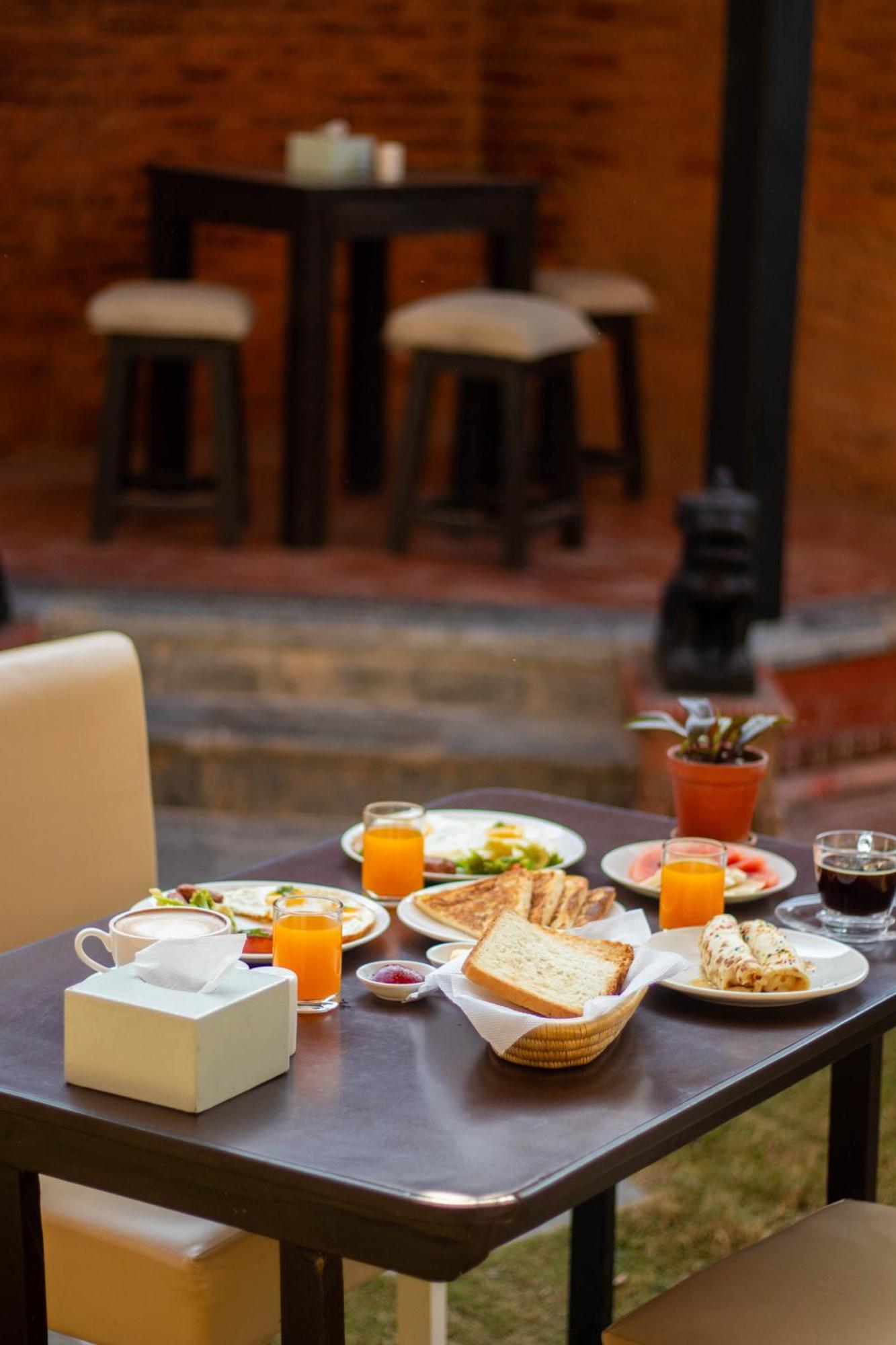 Hotel Ananda Inn Румминдей Экстерьер фото