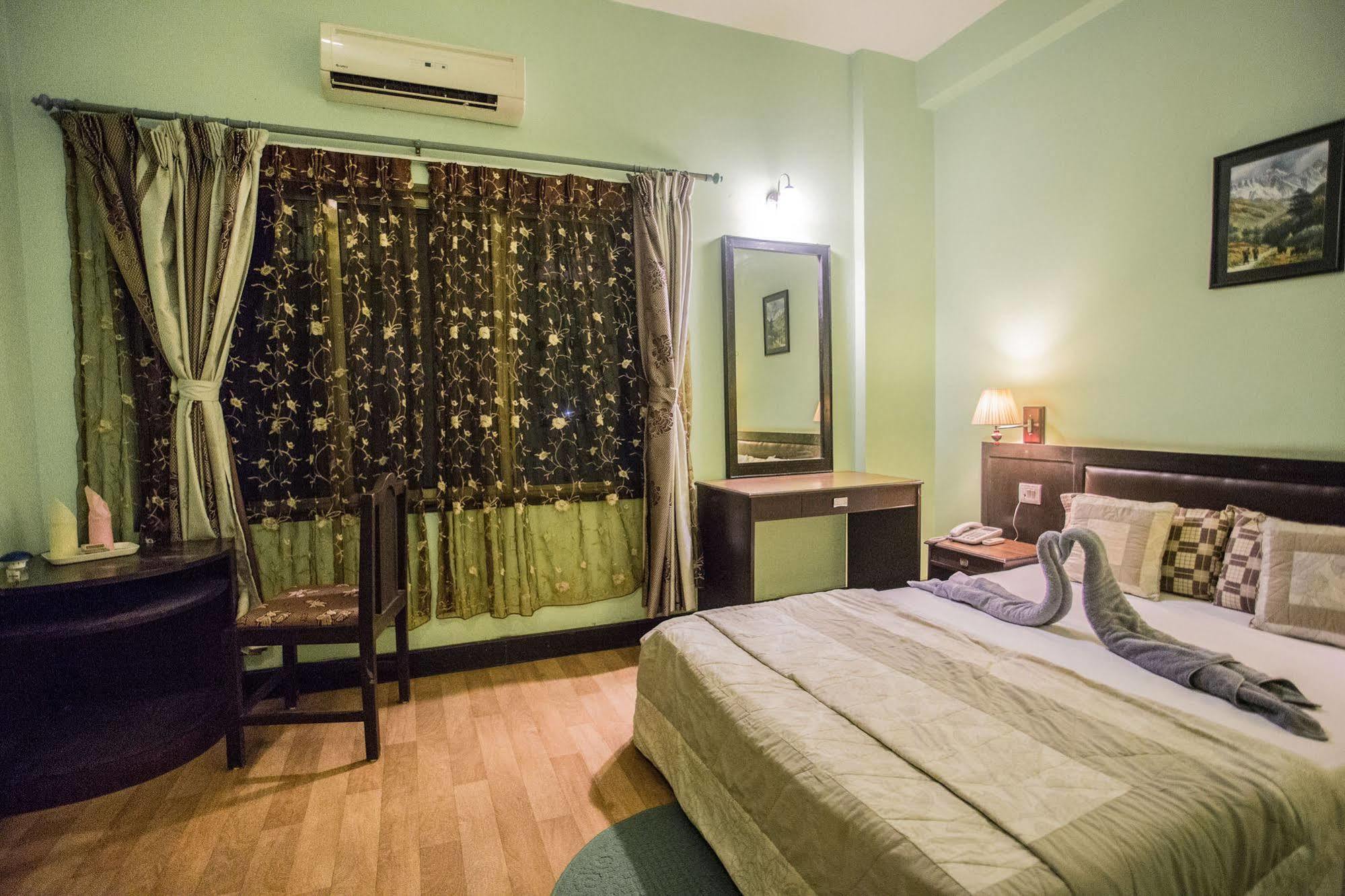 Hotel Ananda Inn Румминдей Экстерьер фото